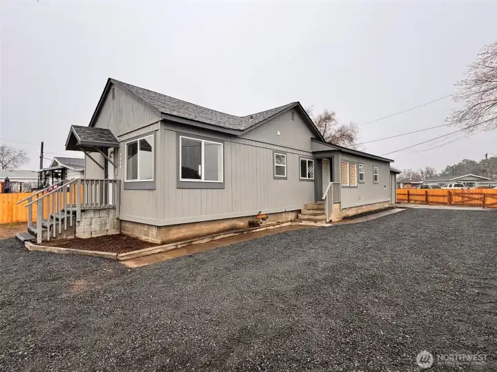 Great gravel driveway with easy access to kitchen.