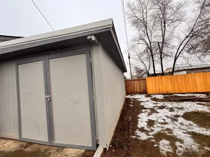 Garage and side yard.