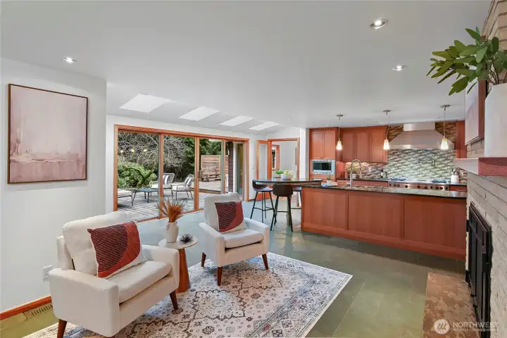 Cozy central propane fireplace and skylights to bring in light.