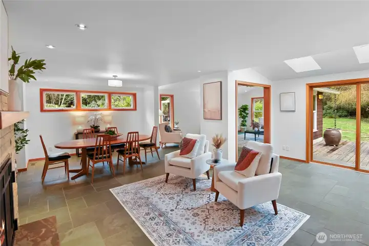 Kitchen flows to back garden, dining and living area.