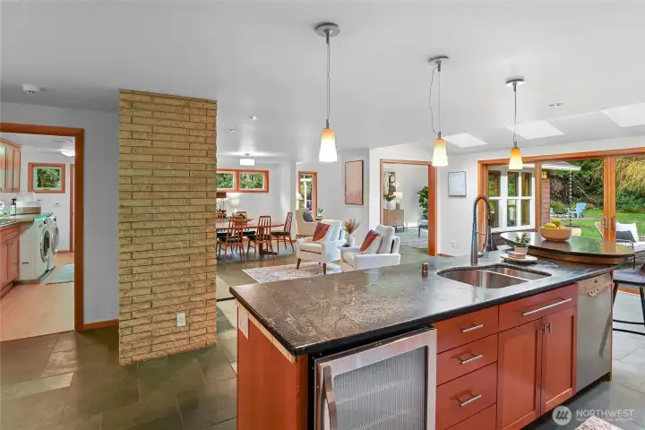 Inviting and central is the kitchen hub.