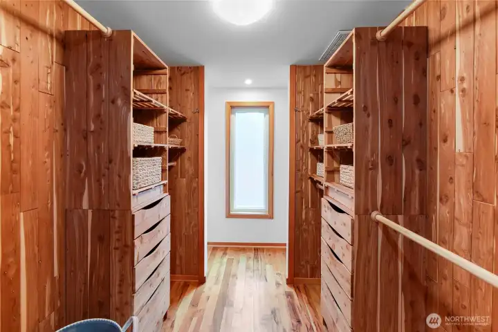 Primary closet with custom built-ins.