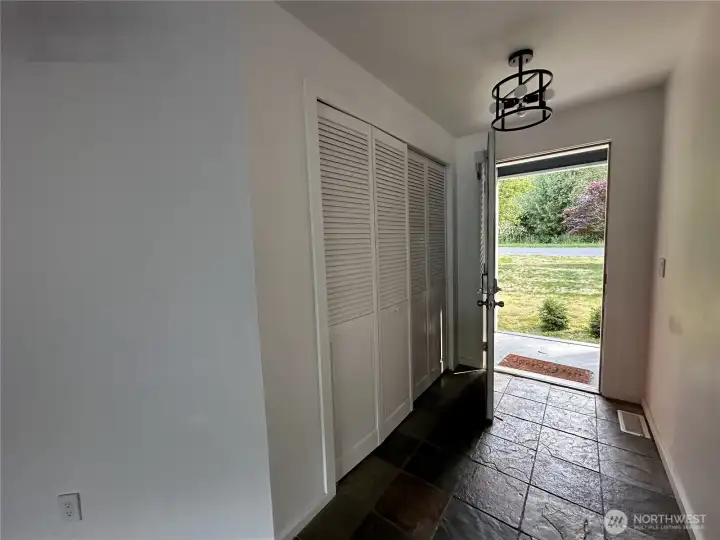 Front door and entry hallway