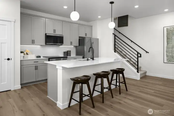 Kitchen of model home. Finishes and features may vary.