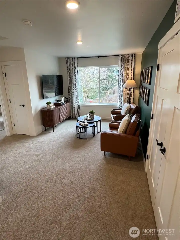 Bonus loft of model home. Finishes and features may vary.