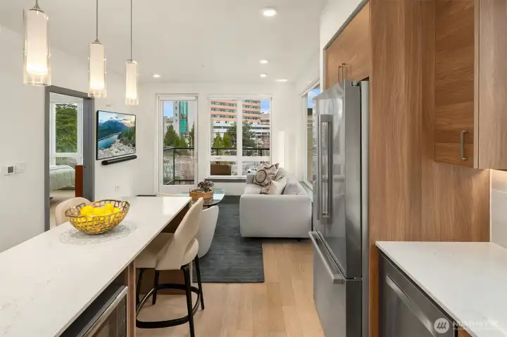 Featuring quartz slab countertops and Bosch stainless steel appliances.