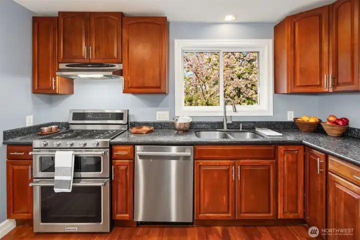 Kitchen overlooks gorgeous yard!
