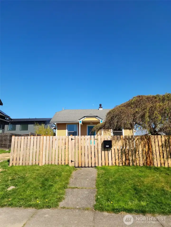 View from street includes new fence.