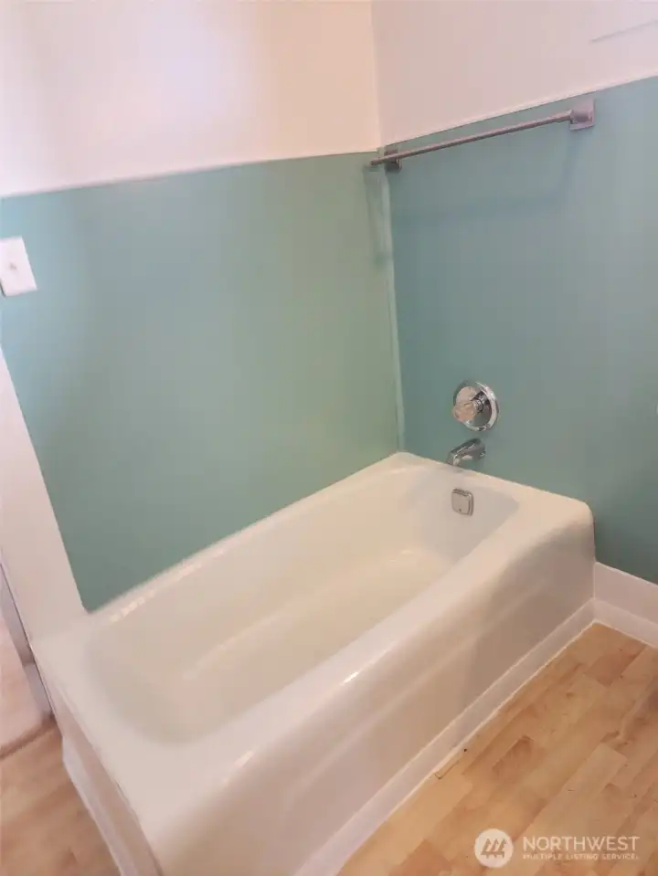 Separate bathtub in the bathroom.