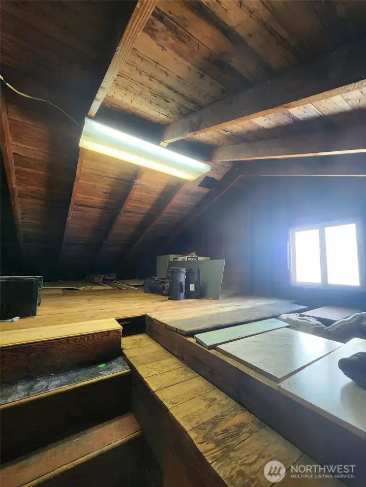 Partial view of attic and stairway.