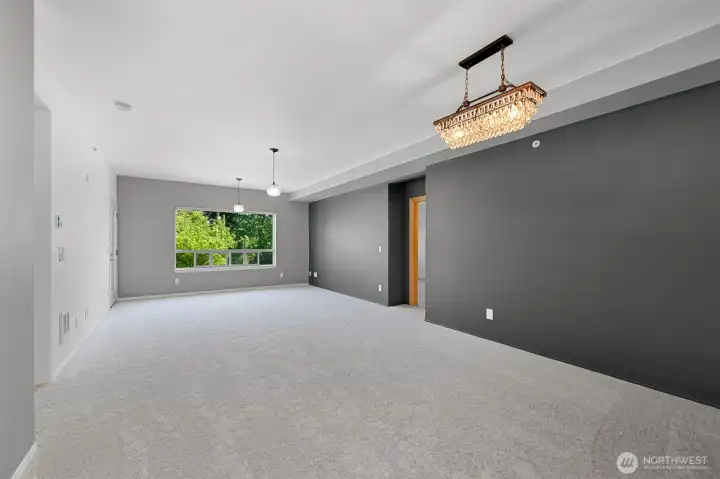 Dining and living room, brand new carpet and a fresh coat of paint