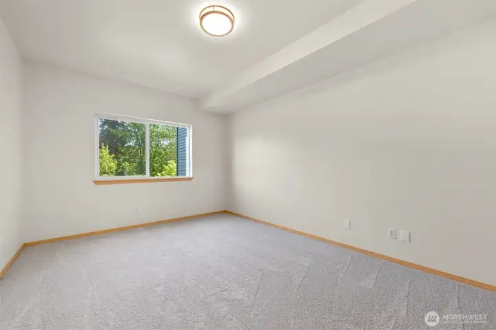 Primary bedroom #1, new carpet!