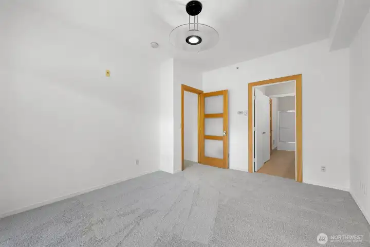 Primary bedroom #2 entrance to room on the left, bathroom & walk in closet to the right