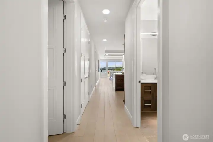 A grand gallery-style entry creates an immediate sense of sophistication, drawing your eye toward the breathtaking Mount Rainier and Puget Sound views. A grand gallery-style entry creates an immediate sense of sophistication, drawing your eye toward the breathtaking Mount Rainier and Puget Sound views.