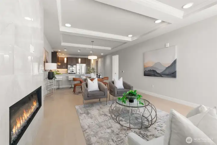 Sophisticated open-concept design effortlessly blends luxurious comfort with exceptional entertaining potential. The coffered ceilings add interest and help define spaces. Sophisticated open-concept design effortlessly blends luxurious comfort with exceptional entertaining potential. The coffered ceilings add interest and help define spaces.