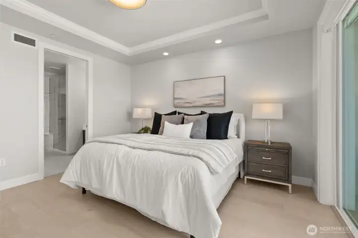 From the serenity of your luxurious private retreat, there is a pocket-door to the primary bath. The bedroom bath and laundry doors are all SOLID core reducing sound transmission and ensuring privacy. From the serenity of your luxurious private retreat, there is a pocket-door to the primary bath. The bedroom bath and laundry doors are all SOLID core reducing sound transmission and ensuring privacy.