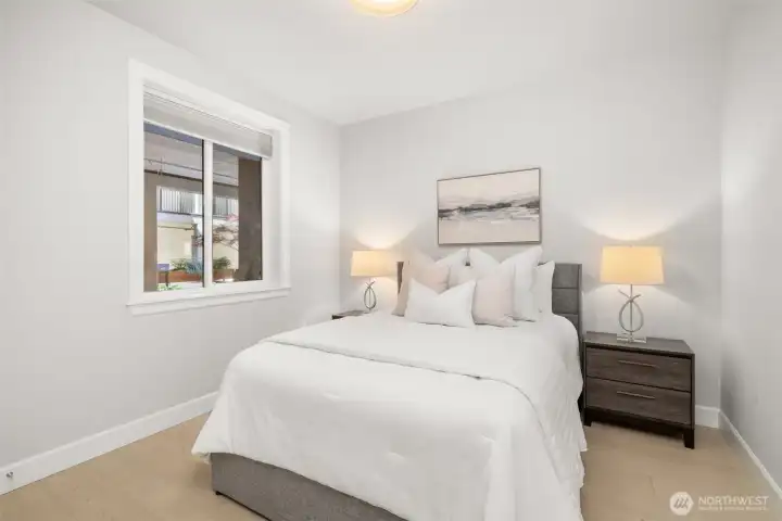Secondary bedroom offering comfort and privacy. Would make for a perfect office too! It opens to the lovely courtyard which will be a gathering place you can also enjoy. Secondary bedroom offering comfort and privacy. Would make for a perfect office too! It opens to the lovely courtyard which will be a gathering place you can also enjoy.