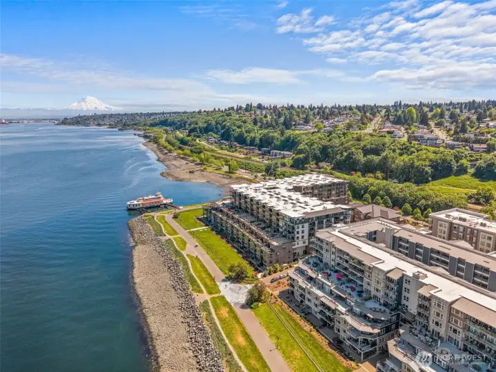 The Rainier Building was the last condo building built at Point Ruston. It is steel and concrete construction, the highest and best way to build a multi-story building because it minimizes noise transfer between levels. Folks say they do not hear the people above them. Look how the sun is off the decks on the North side of the building but shining brightly on the East...highly desireable. The Rainier Building was the last condo building built at Point Ruston. It is steel and concrete construction, the highest and best way to build a multi-story building because it minimizes noise transfer between levels. Folks say they do not hear the people above them. Look how the sun is off the decks on the North side of the building but shining brightly on the East...highly desireable.