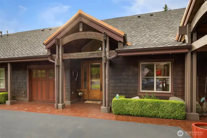 Guests are greeted with a Craftsman style covered entry.