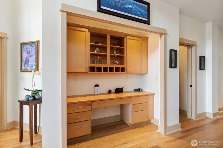 The large great room has beautiful views, vaulted ceilings and a cozy fireplace.