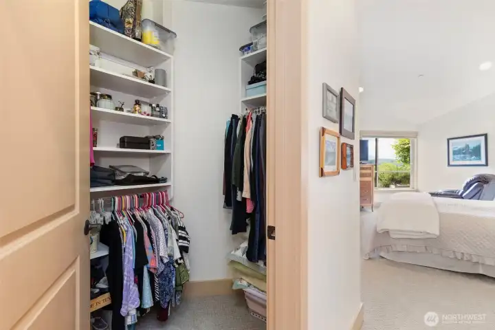 A walk-in closet and secondary closet are features of the primary suite.
