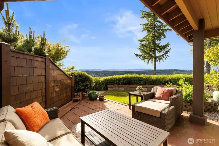 The private patio enjoys lovely mountain views. Clouds obscured the view on photo day. View photos included