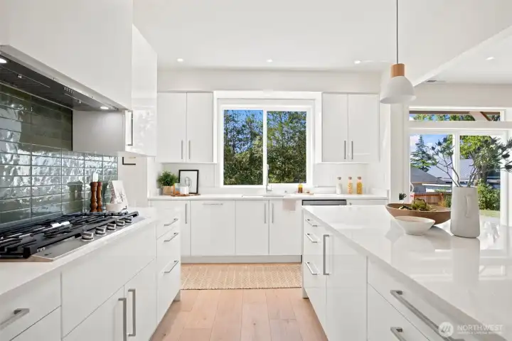 Looking toward the kitchen sink with the views of the bay beyond. Looking toward the kitchen sink with the views of the bay beyond.