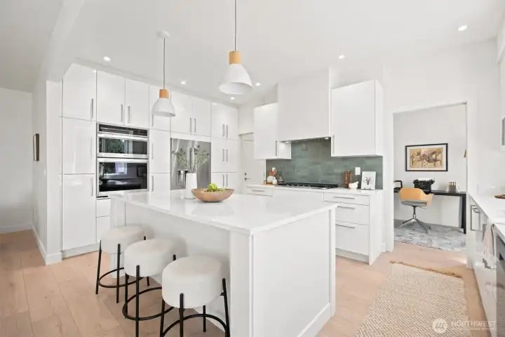 Looking at the kitchen with the abundance of cabinet and counter space. Looking at the kitchen with the abundance of cabinet and counter space.