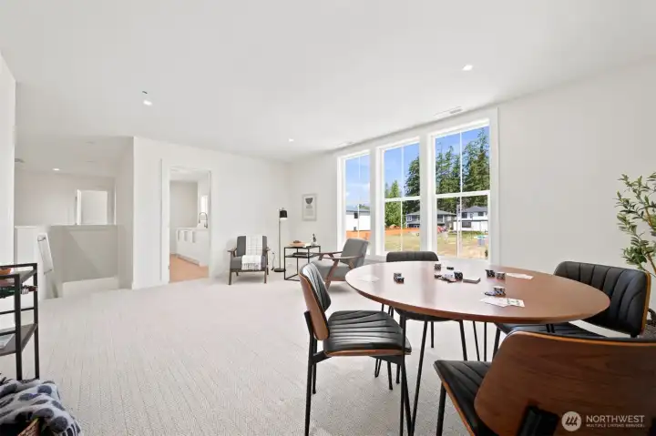 Upstairs you will find this large family room, plus 3 bedrooms, the primary suite, the laundry room and a flex room. Upstairs you will find this large family room, plus 3 bedrooms, the primary suite, the laundry room and a flex room.