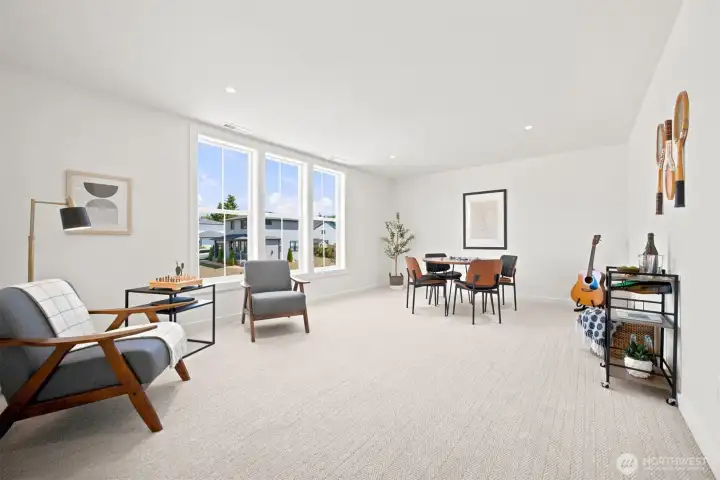 The spacious family room upstairs is near the 3 bedrooms and ideal for a large television and gatherings. The spacious family room upstairs is near the 3 bedrooms and ideal for a large television and gatherings.