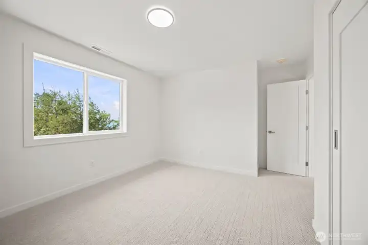 Another of the 3 bedrooms with views of the salt water. Another of the 3 bedrooms with views of the salt water.