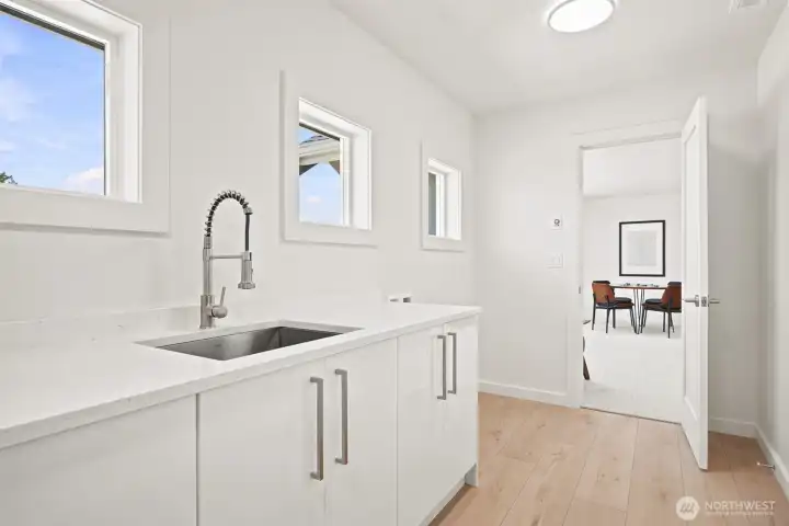 The laundry room is conveniently located upstairs with 4 of the 5 bedrooms. The laundry room is conveniently located upstairs with 4 of the 5 bedrooms.