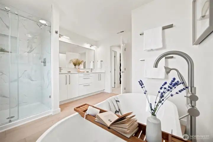 Looking across this amazing full bath in the primary suite. Looking across this amazing full bath in the primary suite.