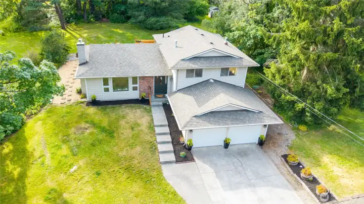 An expansive, level backyard provides exceptional space for entertaining, recreation, gardening, or simply enjoying the peaceful natural surroundings. An expansive, level backyard provides exceptional space for entertaining, recreation, gardening, or simply enjoying the peaceful natural surroundings.