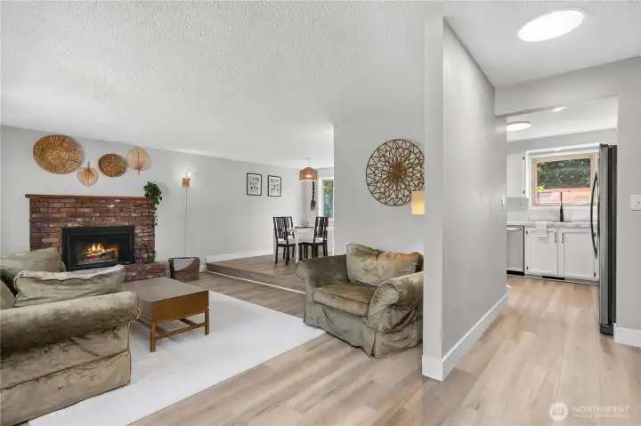 The thoughtful floor plan provides an easy connection between the living room, dining area, and kitchen while maintaining distinct spaces for gathering and everyday living. The thoughtful floor plan provides an easy connection between the living room, dining area, and kitchen while maintaining distinct spaces for gathering and everyday living.
