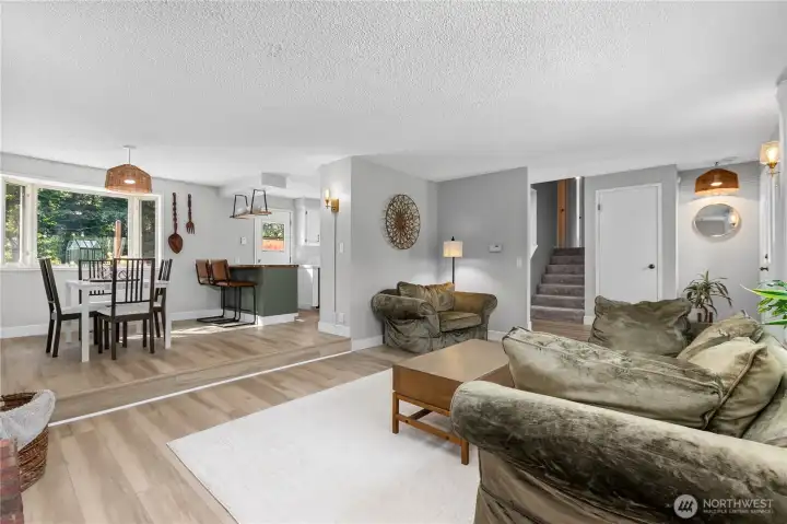 The split-level design provides defined living spaces while maintaining an open flow between the main gathering areas. The split-level design provides defined living spaces while maintaining an open flow between the main gathering areas.