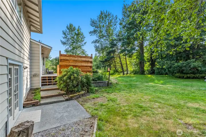 Large deck offers a seamless connection between indoor and outdoor living with generous space for entertaining throughout the seasons. Large deck offers a seamless connection between indoor and outdoor living with generous space for entertaining throughout the seasons.
