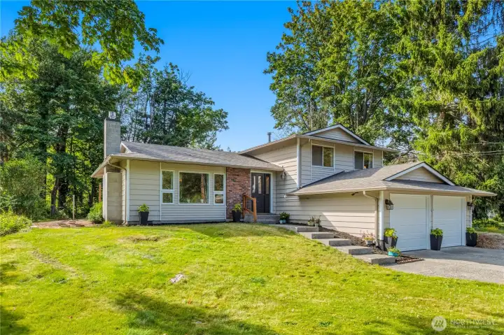 Wide-open green space offers endless possibilities for recreation, gardening, outdoor entertaining, or simply enjoying the natural surroundings. Wide-open green space offers endless possibilities for recreation, gardening, outdoor entertaining, or simply enjoying the natural surroundings.