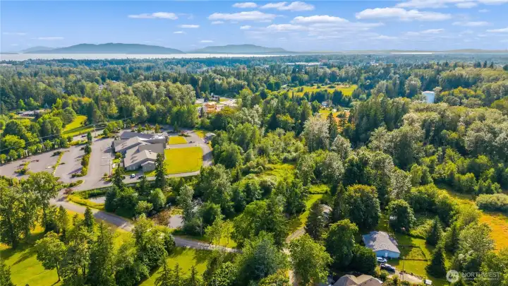 The surrounding landscape showcases the natural beauty of Northwest Washington, with forests, open meadows, and nearby water views. The surrounding landscape showcases the natural beauty of Northwest Washington, with forests, open meadows, and nearby water views.