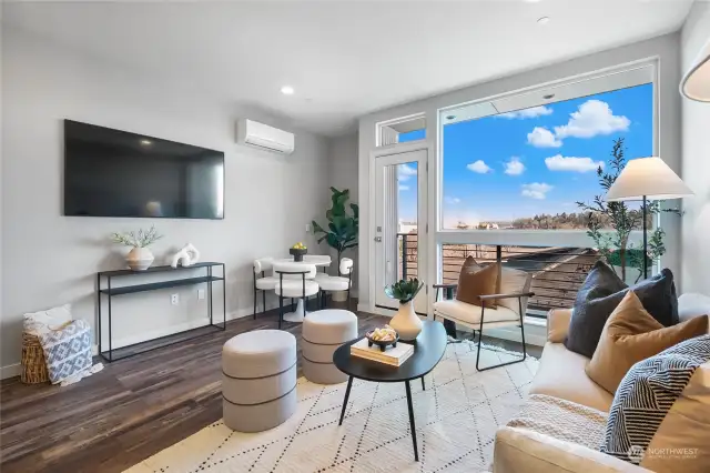 Living & dining area with views of the city