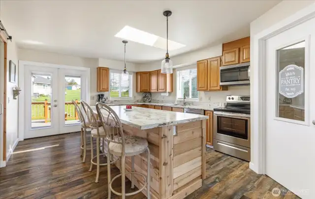 Kitchen is just beyond living room.