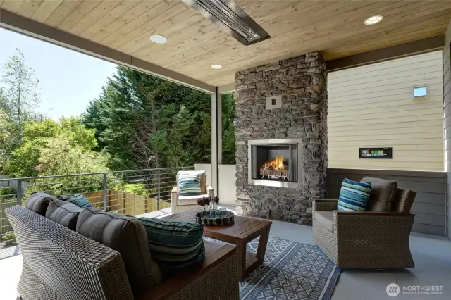 Covered Deck off Kitchen with gas fireplace & BBQ stub, Space heater & ceiling speakers. Outdoor entertain & BBQ year round.