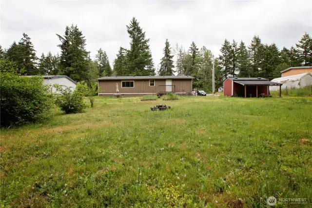 Lot size is .97 acres; shed and lean to included.