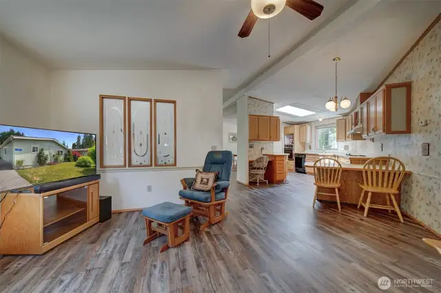 Immediately you will notice the open flow of this floor plan. Easy care and durable Luxury Vinyl plank flooring is installed throughout the main areas.
