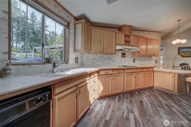 This open kitchen is large enough for several people all cooking, serving, and socializing together.