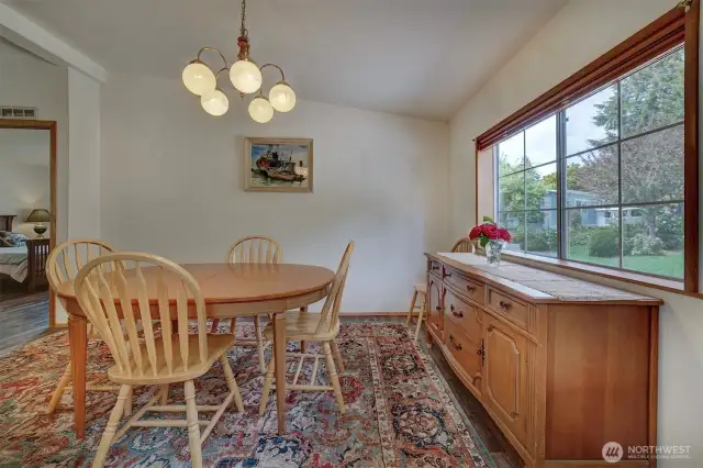 The size of this dinning room easily accommodates an expanded table for holidays and special occasions.