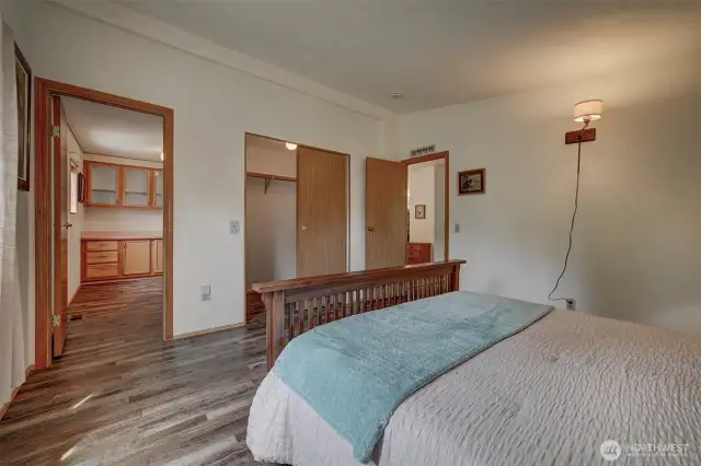 The principle bedroom enjoys a deep generous walk-in closet and adjoining bathroom.