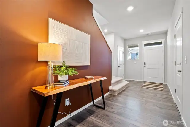 Spacious entry hall is a warm welcome.