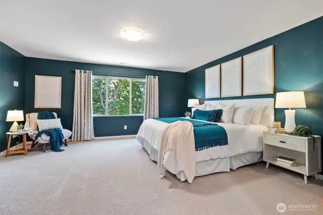 The spacious primary suite includes a walk-in closet and a luxe ensuite that feels like your own personal retreat