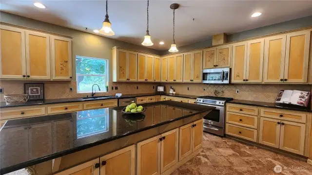 The kitchen offers tons of storage.
